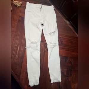 White, distressed American Eagle next level stretch size 10 demin skinny